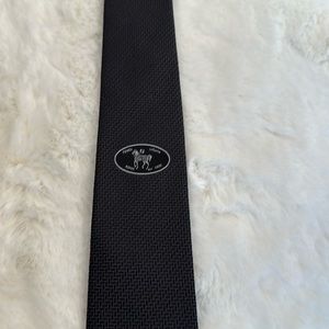 Skinny black fancy tie.